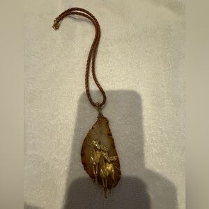 Stone and gold tone pendant necklace